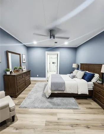 a large white bed in a room