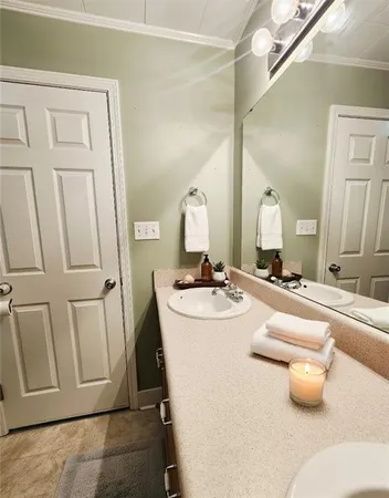 a view of hallway with wooden floor