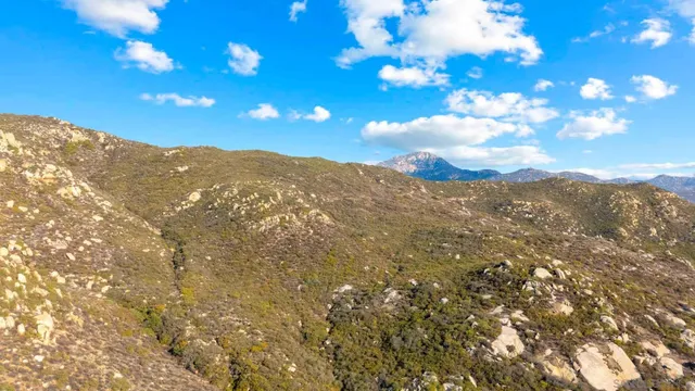 a view of mountain with lake view