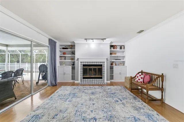 a view of a patio with a dining table and chairs