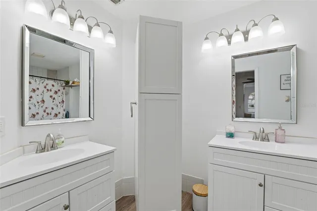 an aerial view of residential house with outdoor space and swimming pool