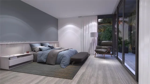 a bedroom with a bed couch and a window