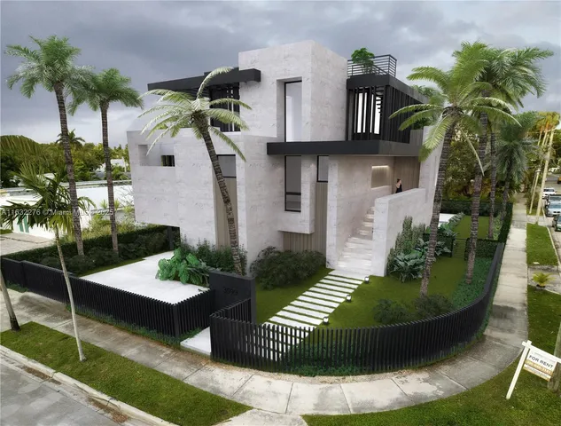 a view of a chair and table in the house