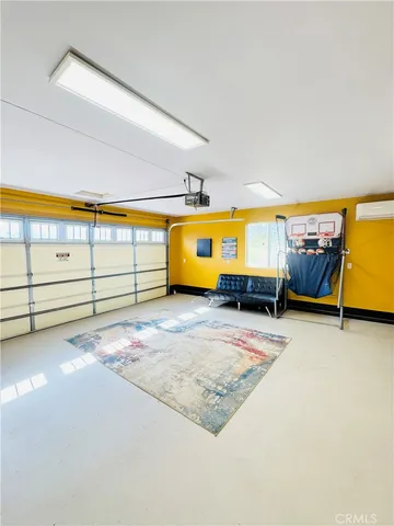 a bedroom with bed and window