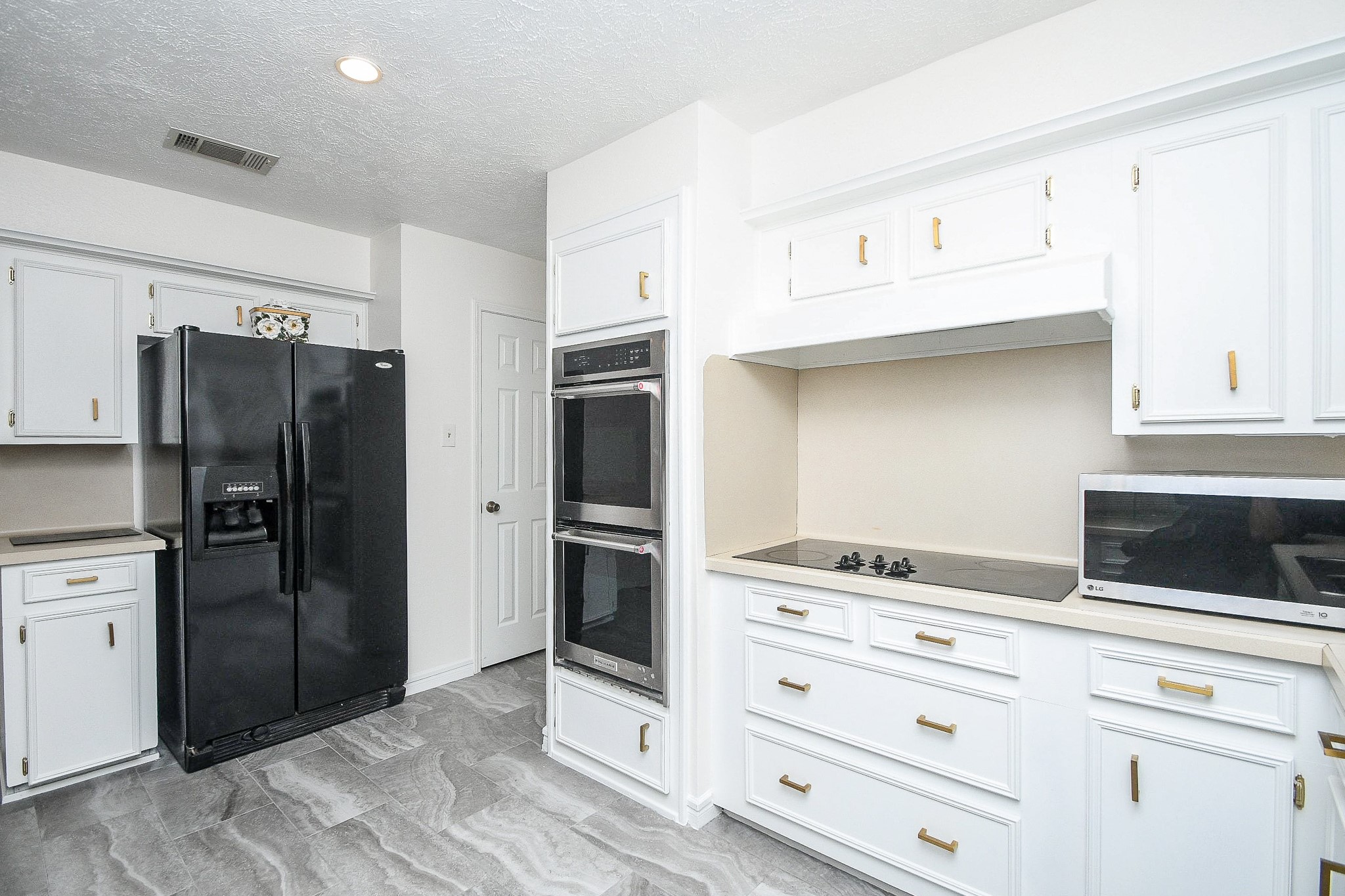 11635 Sagevale Lane Houston, TX 77089 - Photo 11 of 32 Here's another view of kitchen storage and placement of appliances.