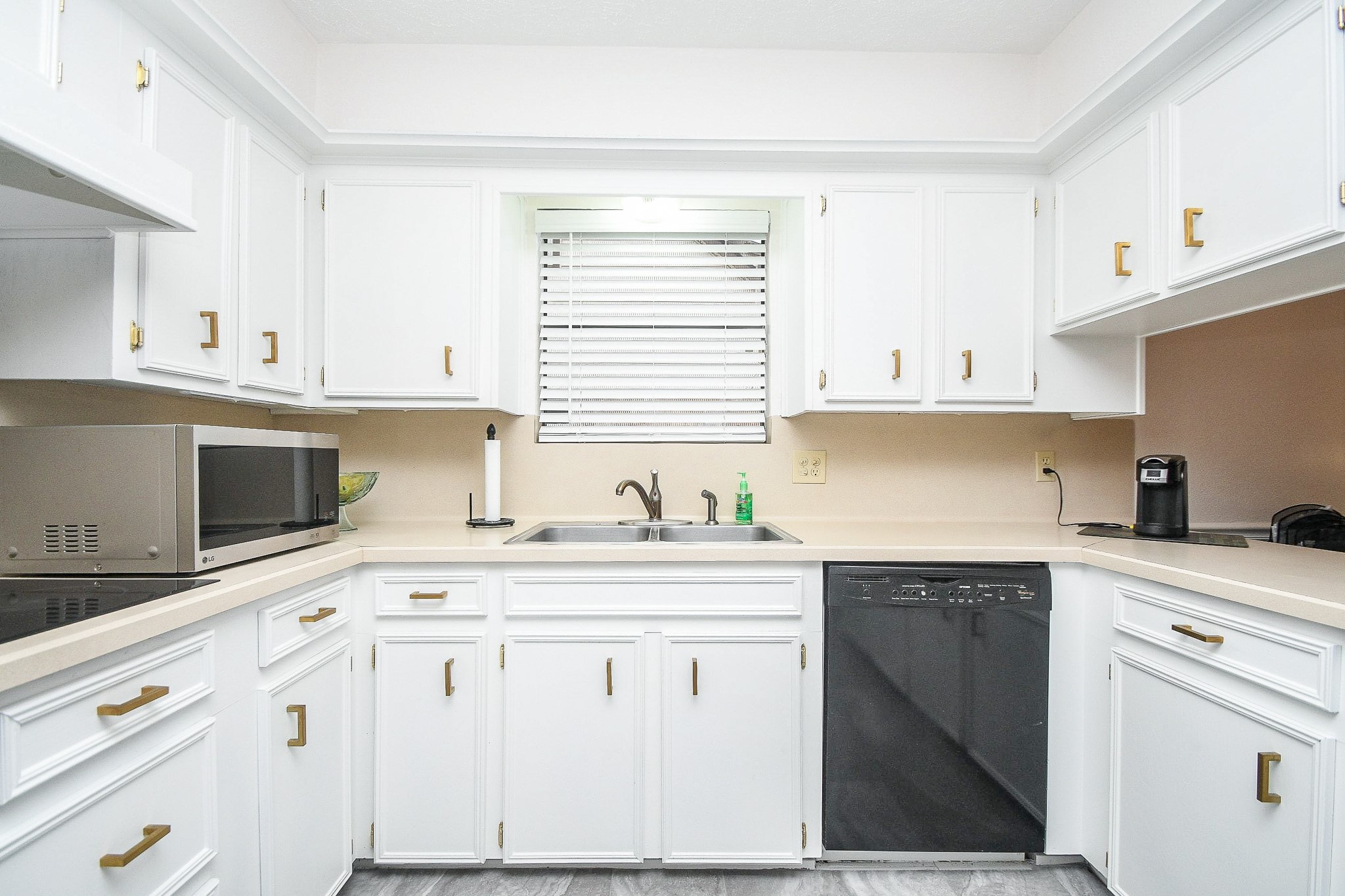 11635 Sagevale Lane Houston, TX 77089 - Photo 12 of 32 Everything is within fingertip reach in this full kitchen, with the addition of a welcomed window over the dual sinks.