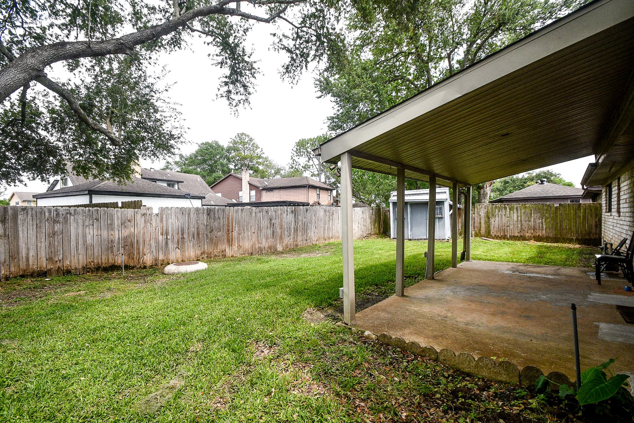 11635 Sagevale Lane Houston, TX 77089 - Photo 27 of 32 Sturdy privacy fencing surrounds your ample backyard and comfortable covered patio.