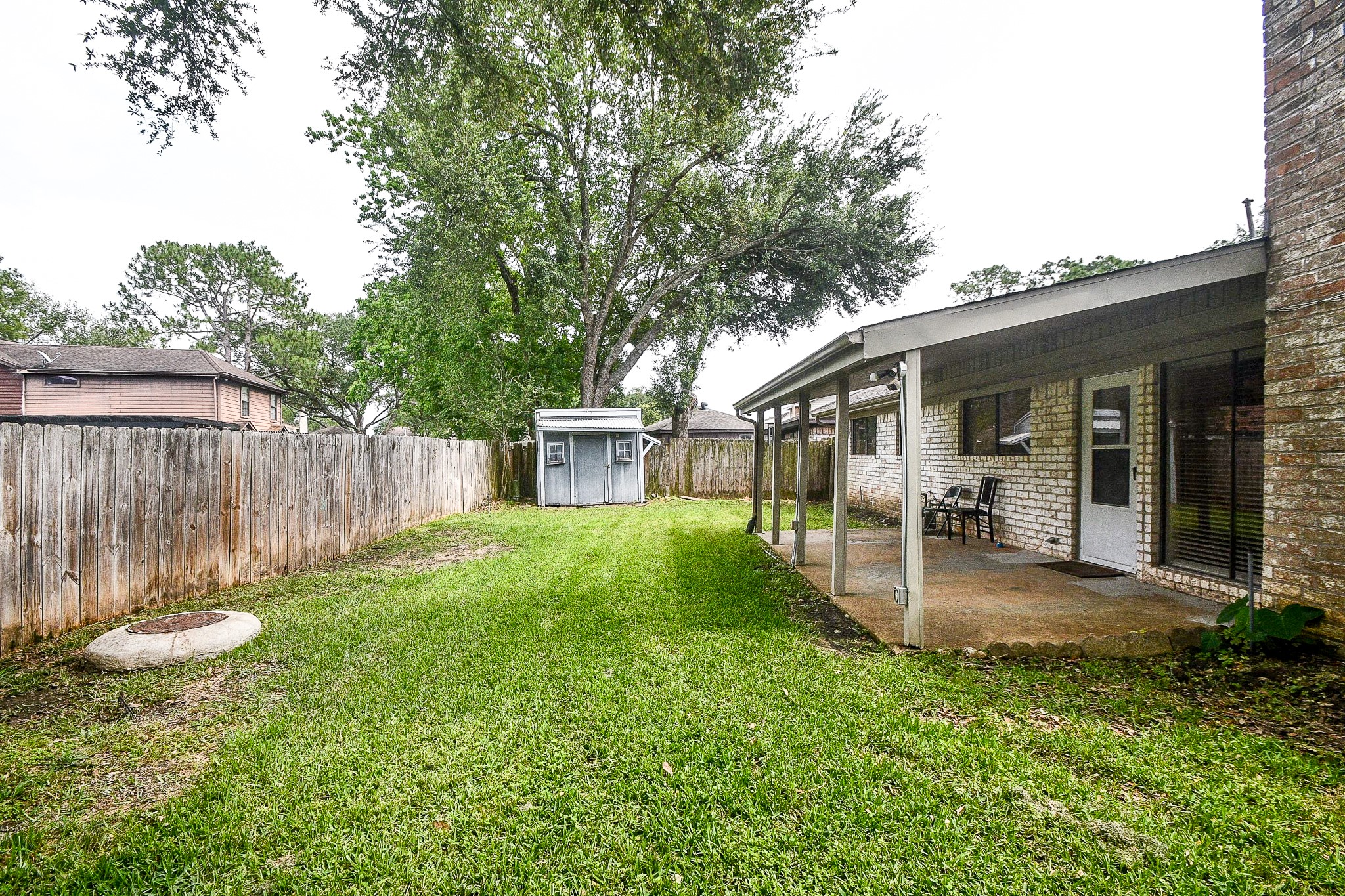 11635 Sagevale Lane Houston, TX 77089 - Photo 28 of 32 What a great expanse of lawn and space --- perfect for some football tossing and family pet activity.