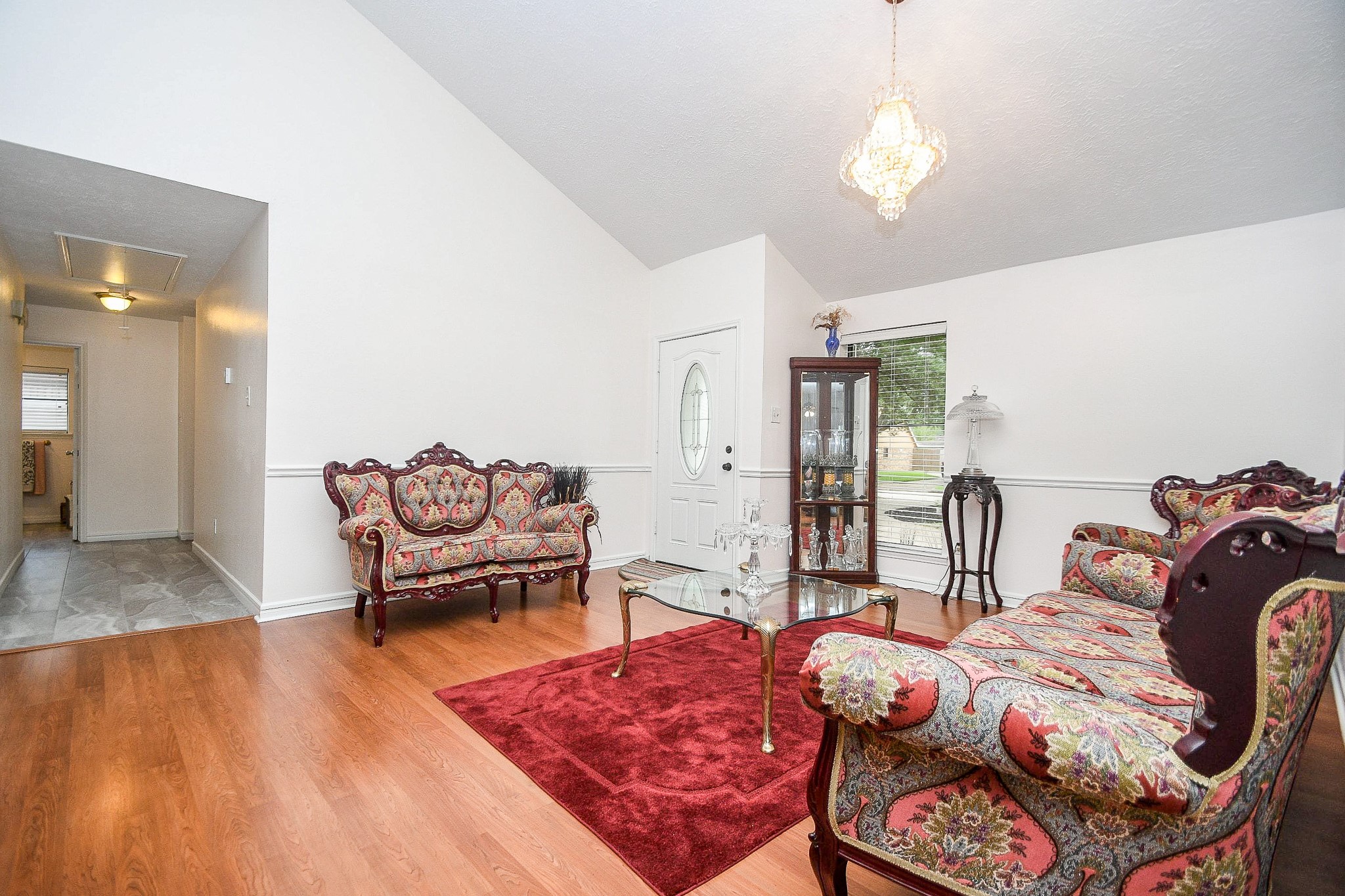 11635 Sagevale Lane Houston, TX 77089 - Photo 6 of 32 Easy access is ensured from living to bedrooms, left.