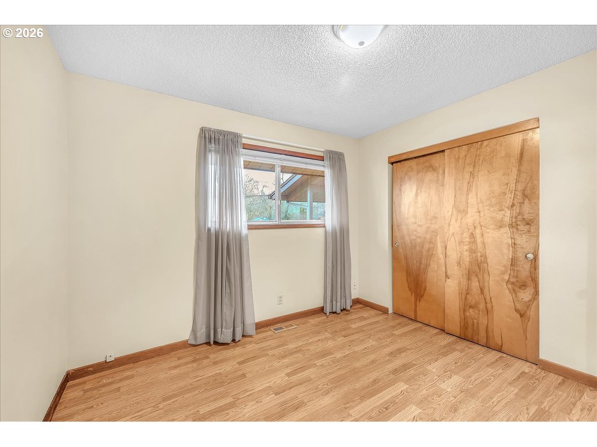 2775 Southwest 182nd Avenue Beaverton, OR 97003 - Photo 19 of 35 a view of an empty room with closet and a window