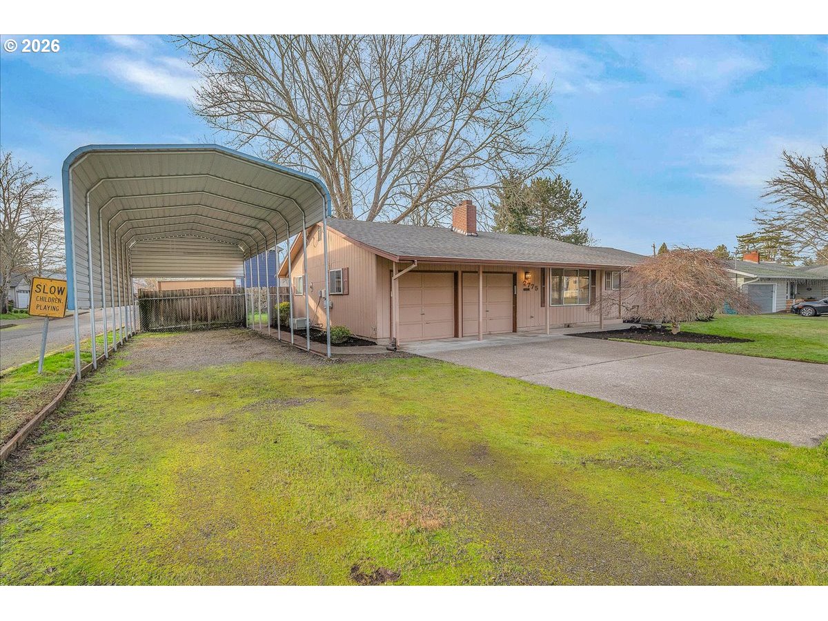 2775 Southwest 182nd Avenue Beaverton, OR 97003 - Photo 31 of 35 a view of a house with a yard