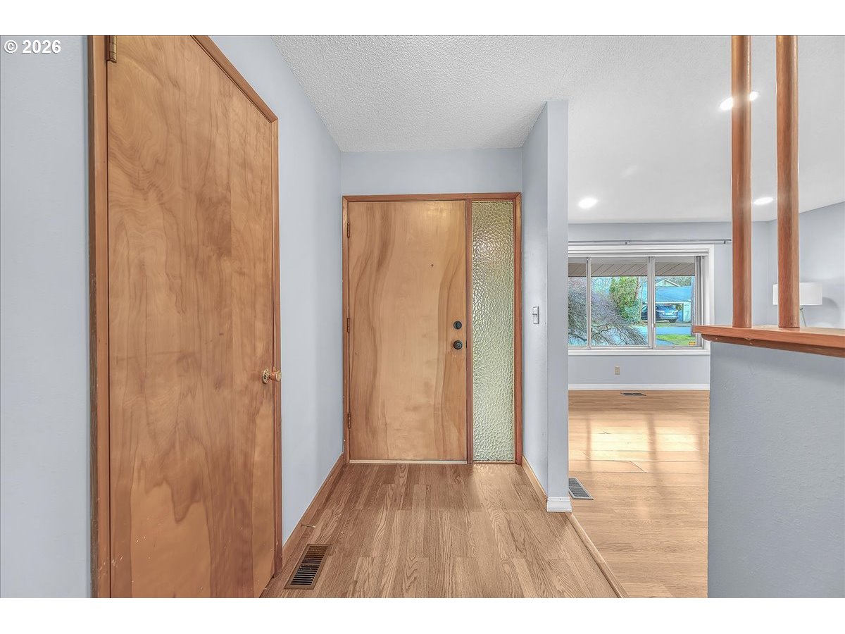 2775 Southwest 182nd Avenue Beaverton, OR 97003 - Photo 4 of 35 a view of an entryway with wooden floor