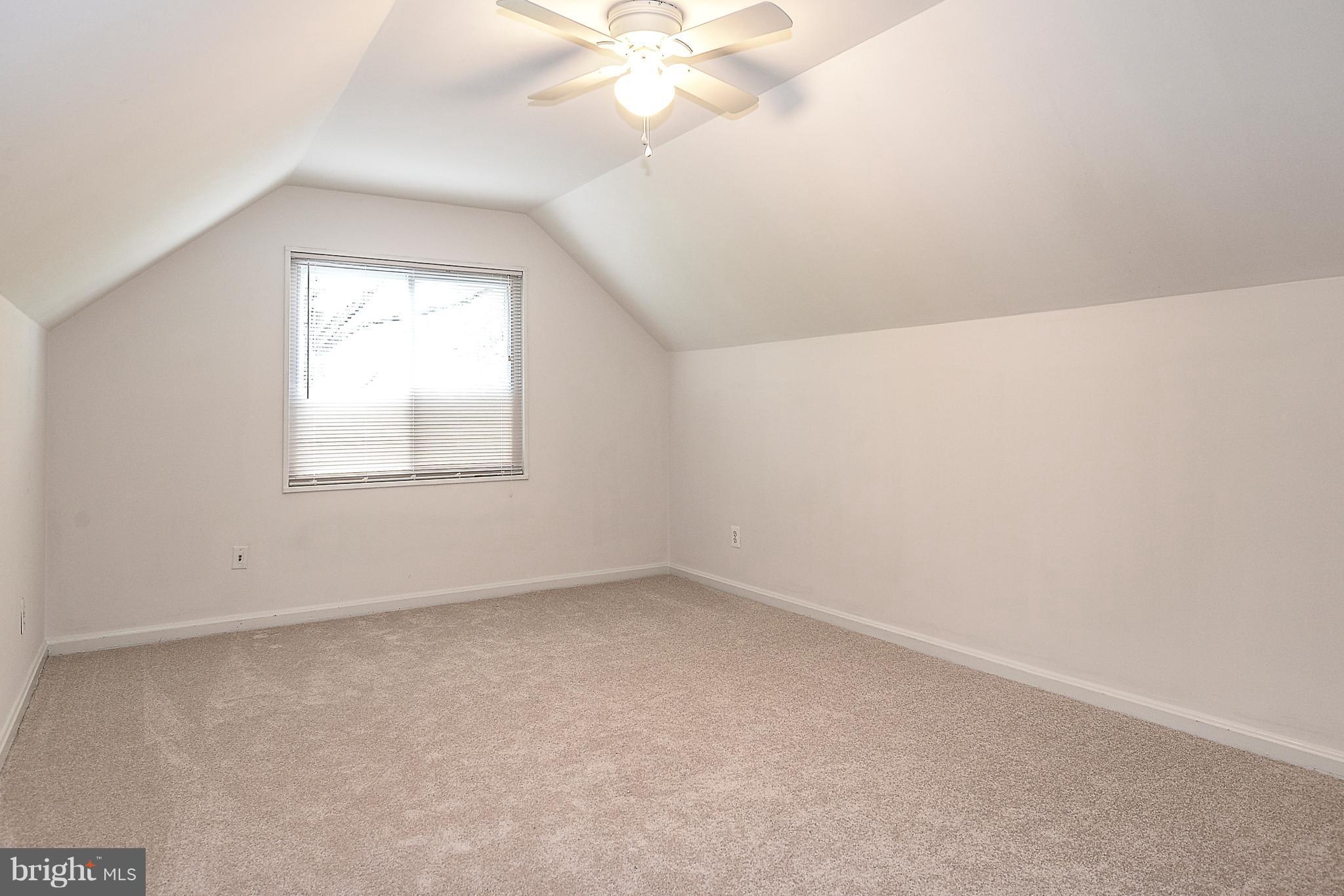 7106 Reservoir Road Springfield, VA 22150 - Photo 12 of 18 an empty room with a window