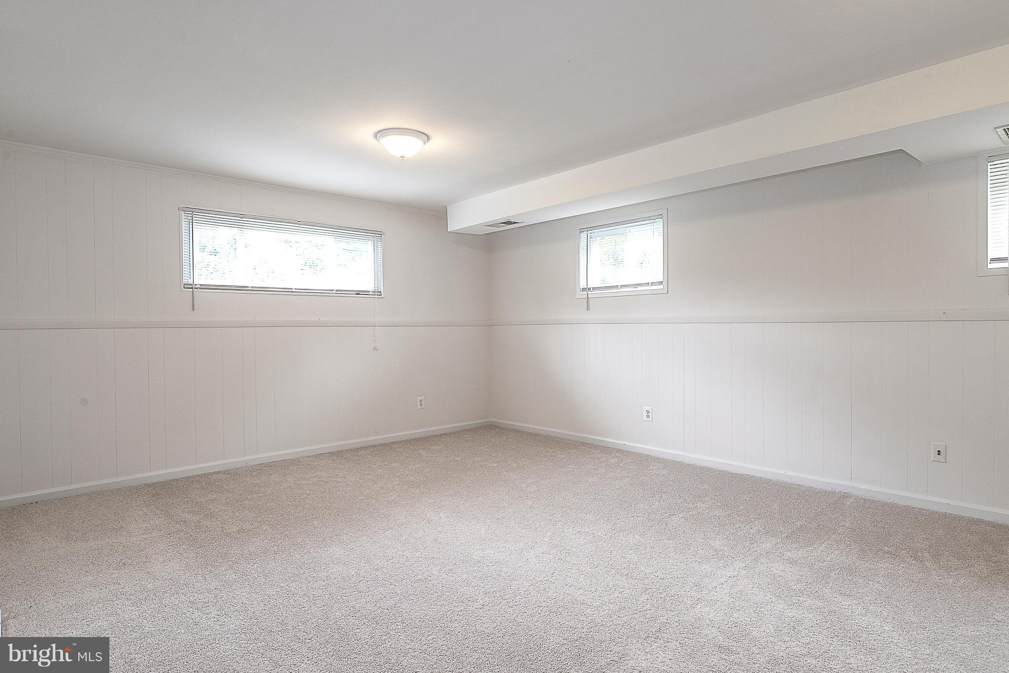 7106 Reservoir Road Springfield, VA 22150 - Photo 14 of 18 an empty room with a window