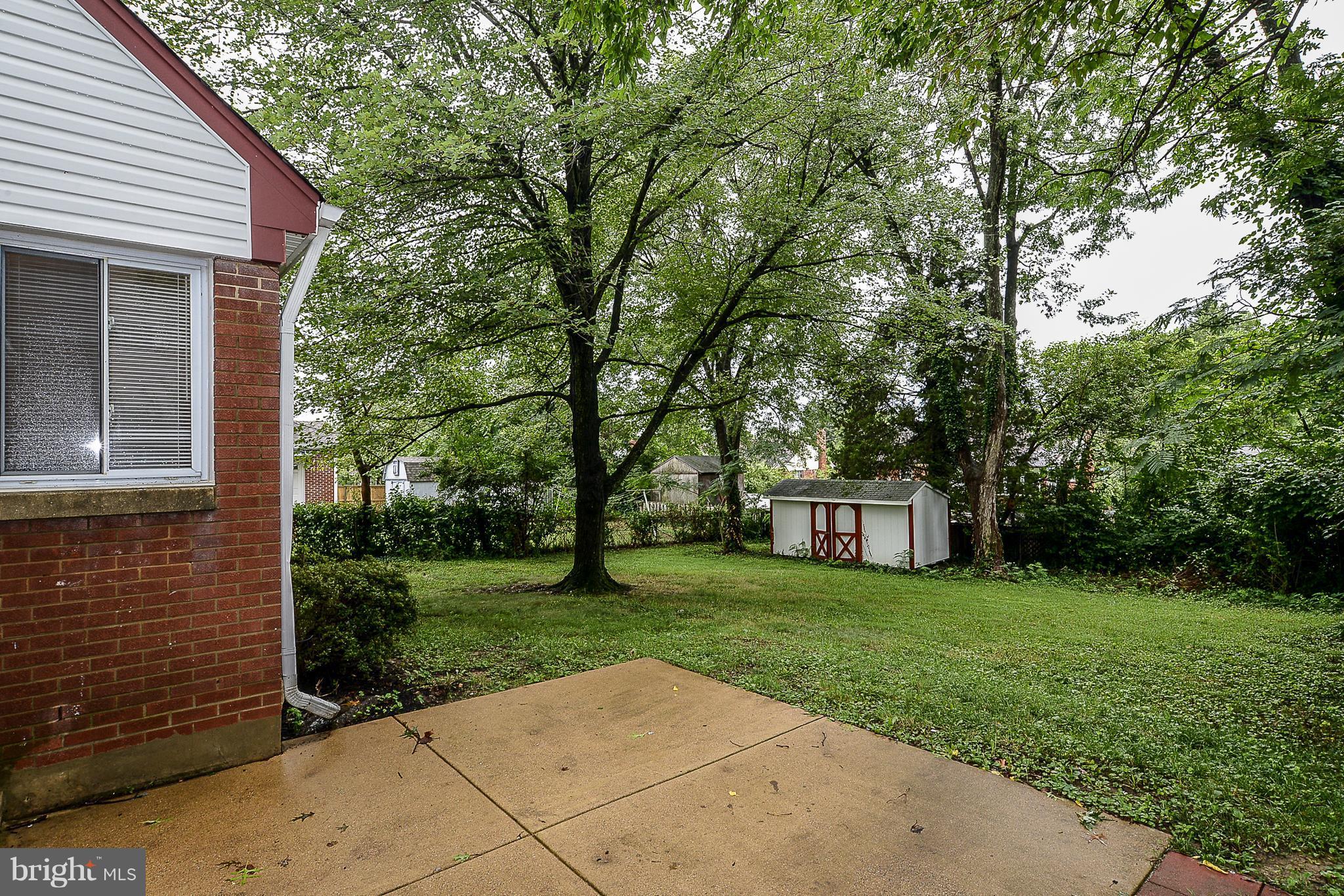 7106 Reservoir Road Springfield, VA 22150 - Photo 3 of 18 a view of a house with a yard