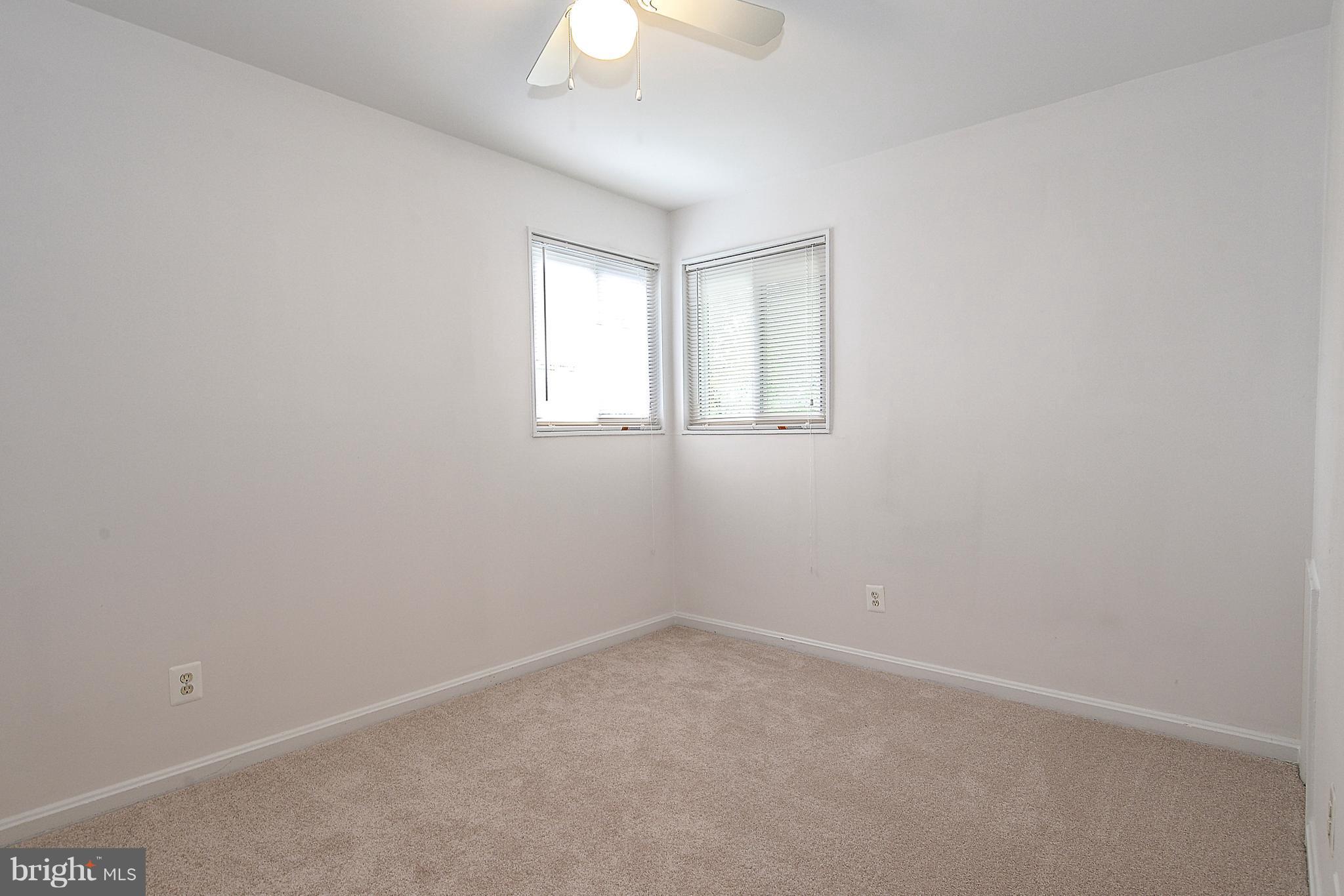 7106 Reservoir Road Springfield, VA 22150 - Photo 10 of 18 an empty room with a window