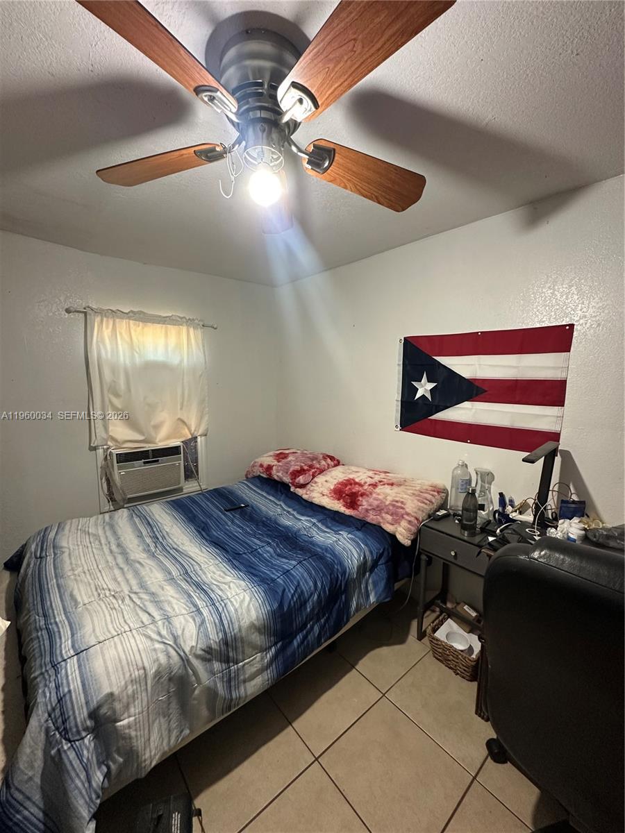 212 Ballard Road Avon Park, FL 33825 - Photo 12 of 61 a bedroom with a bed and window