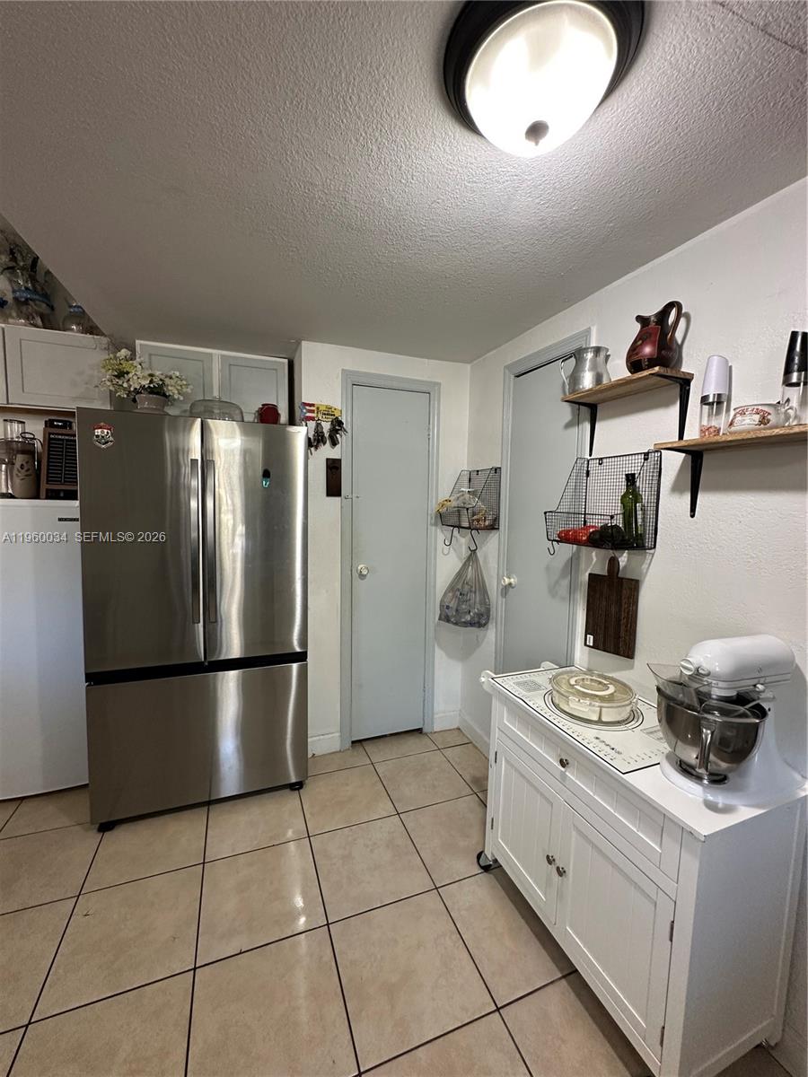 212 Ballard Road Avon Park, FL 33825 - Photo 61 of 61 a kitchen with appliances cabinets and a counter top space