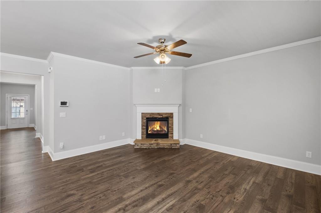 75 South Cornucopia Bend Dallas, GA 30132 - Photo 12 of 35 a view of an empty room with window and wooden floor