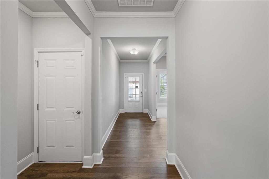 75 South Cornucopia Bend Dallas, GA 30132 - Photo 15 of 35 a view of a hallway with wooden floor