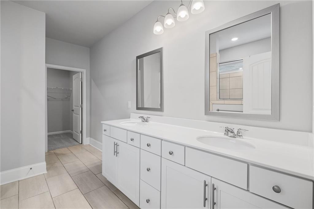 75 South Cornucopia Bend Dallas, GA 30132 - Photo 20 of 35 a bathroom with a sink and a mirror