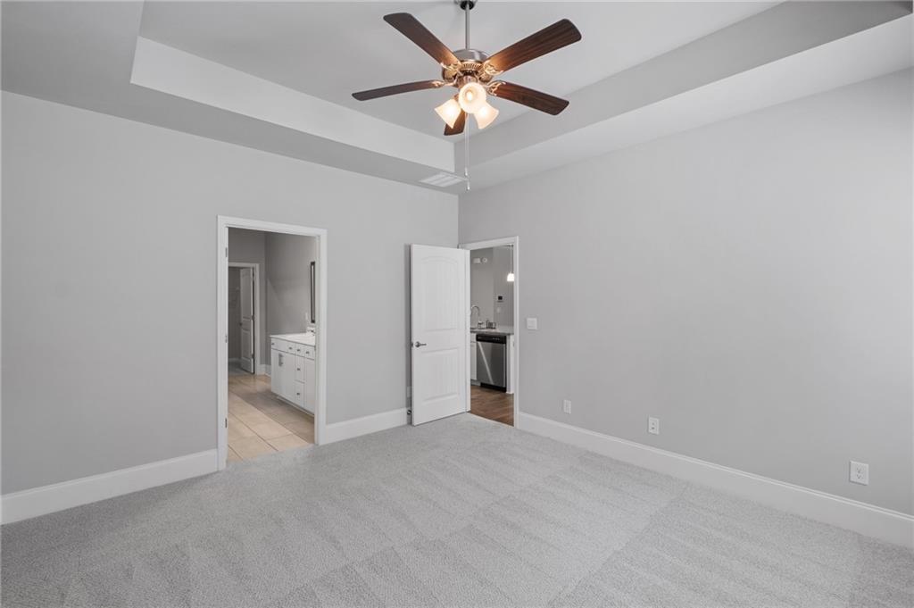 75 South Cornucopia Bend Dallas, GA 30132 - Photo 26 of 35 an empty room with closet and a ceiling fan