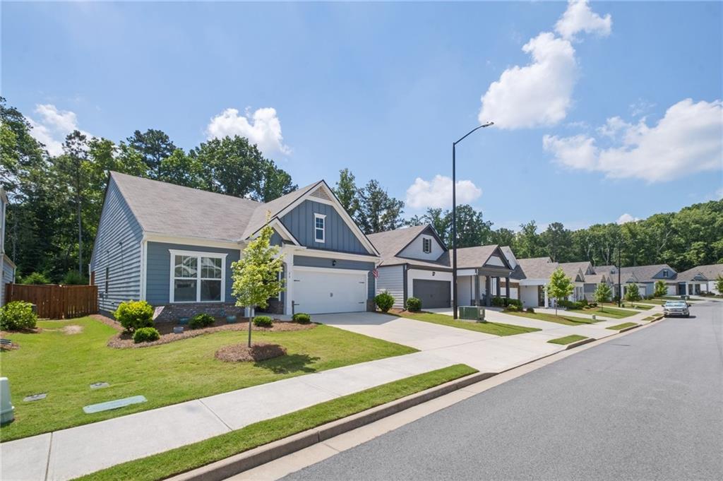 75 South Cornucopia Bend Dallas, GA 30132 - Photo 3 of 35 a front view of a house with garden