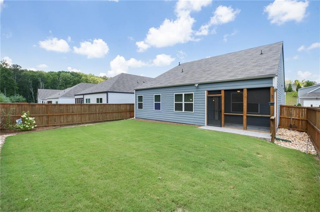 75 South Cornucopia Bend Dallas, GA 30132 - Photo 31 of 35 a house view with a garden space