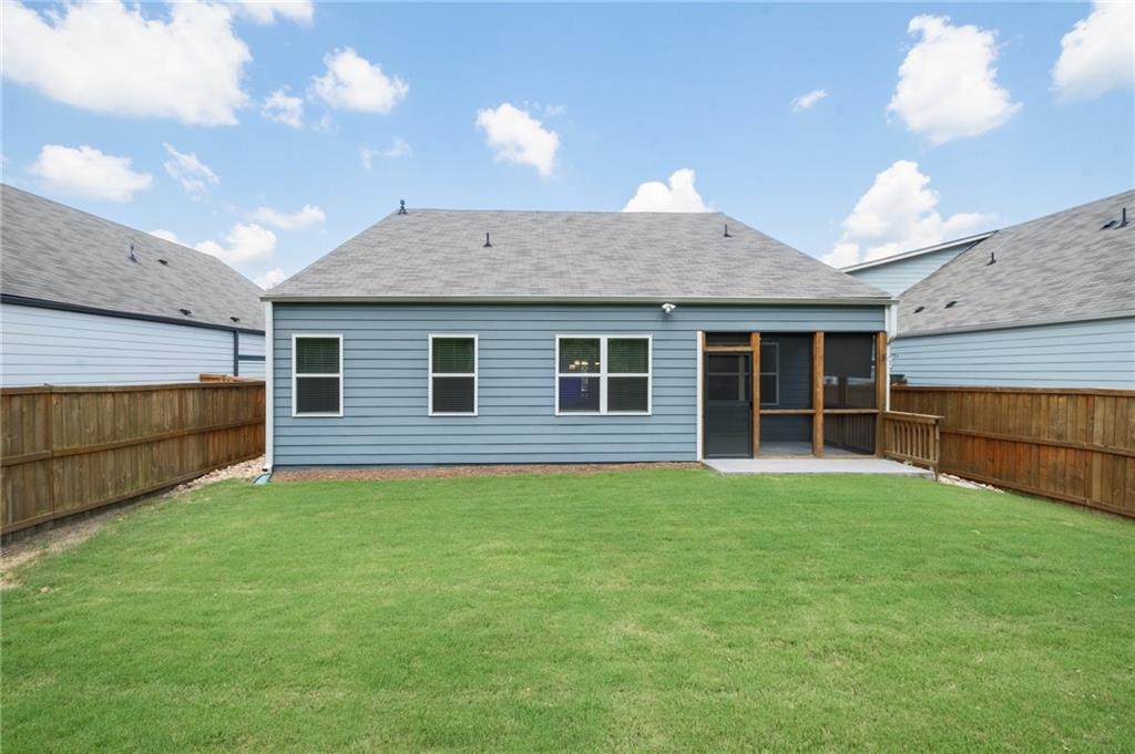 75 South Cornucopia Bend Dallas, GA 30132 - Photo 32 of 35 a front view of a house with a garden