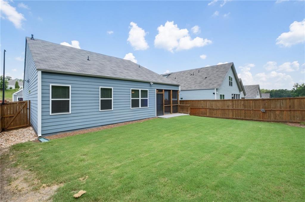 75 South Cornucopia Bend Dallas, GA 30132 - Photo 33 of 35 a backyard of a house with lots of green space