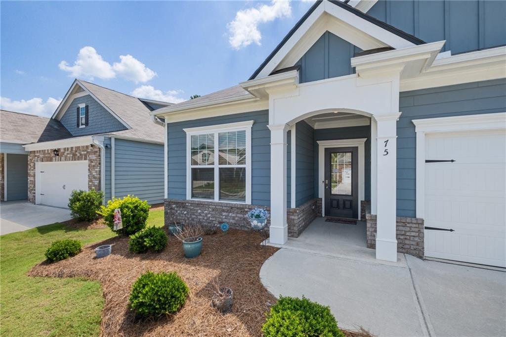 75 South Cornucopia Bend Dallas, GA 30132 - Photo 4 of 35 a front view of a house with garden