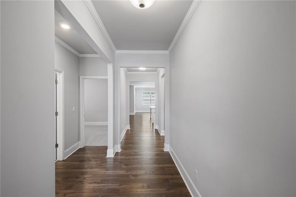 75 South Cornucopia Bend Dallas, GA 30132 - Photo 5 of 35 a view of a hallway with wooden floor