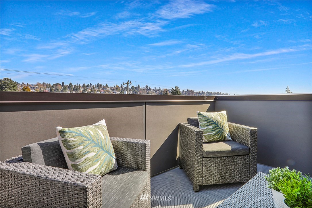 6241 8th Avenue Northwest Seattle, WA 98107 - Photo 23 of 27 a view of a couch in the roof of a terrace