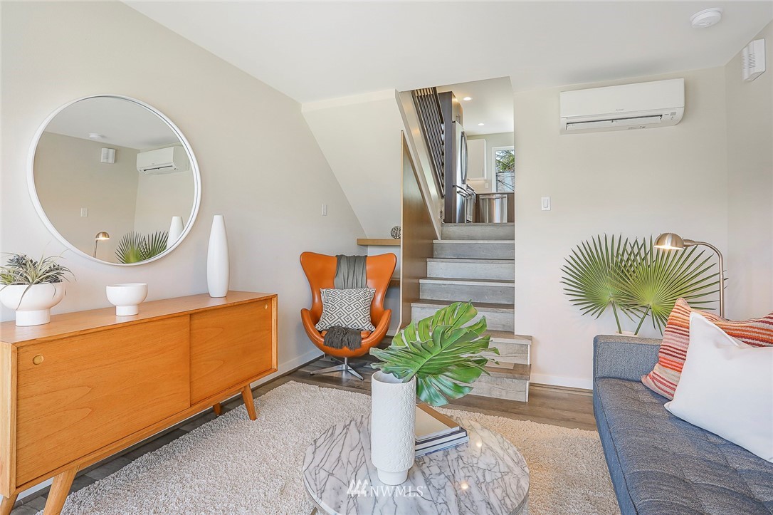 6241 8th Avenue Northwest Seattle, WA 98107 - Photo 5 of 27 a living room with furniture and a mirror