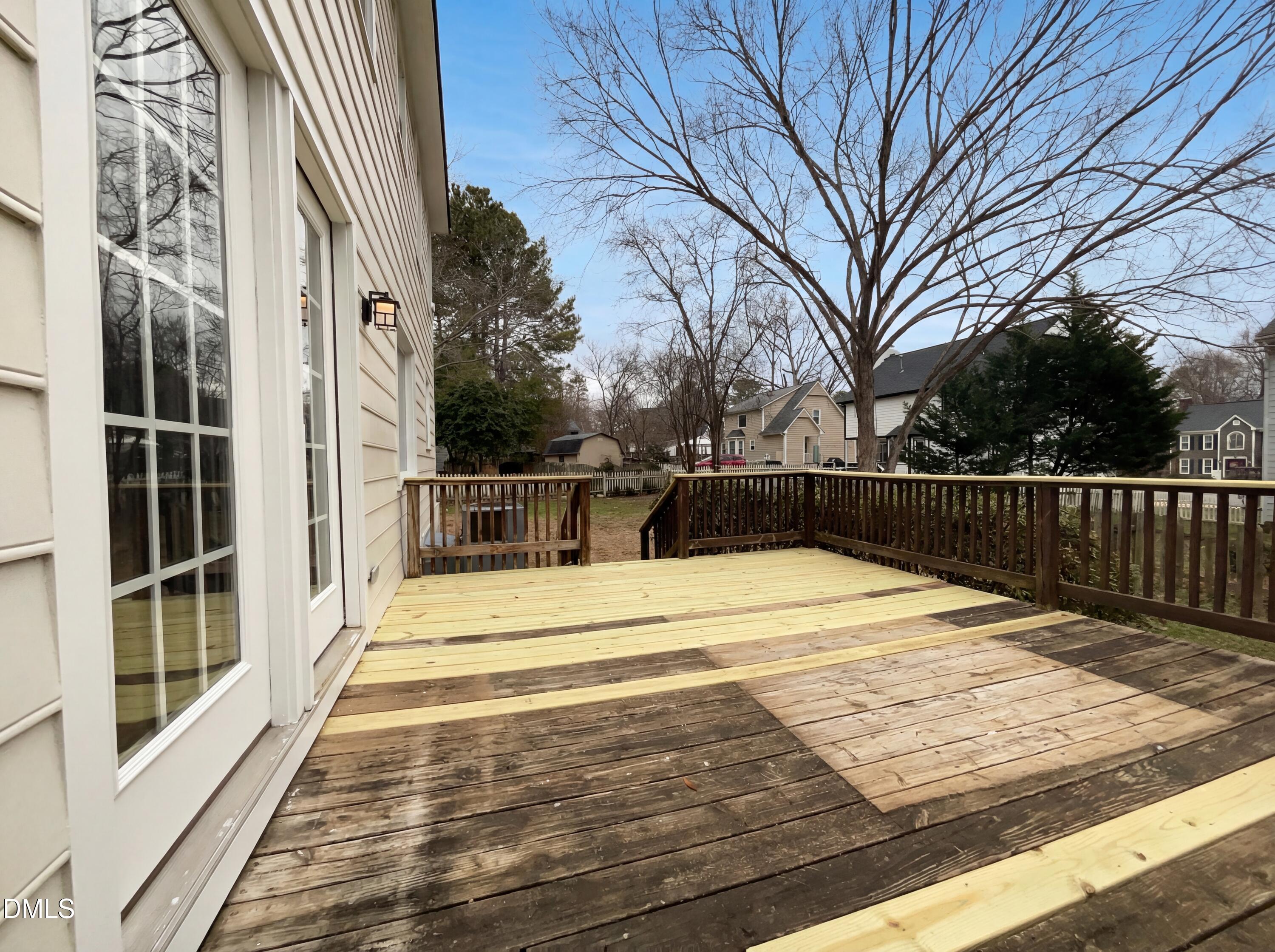8612 Clovehitch Court Raleigh, NC 27615 - Photo 19 of 21 a view of a brick house with a large window