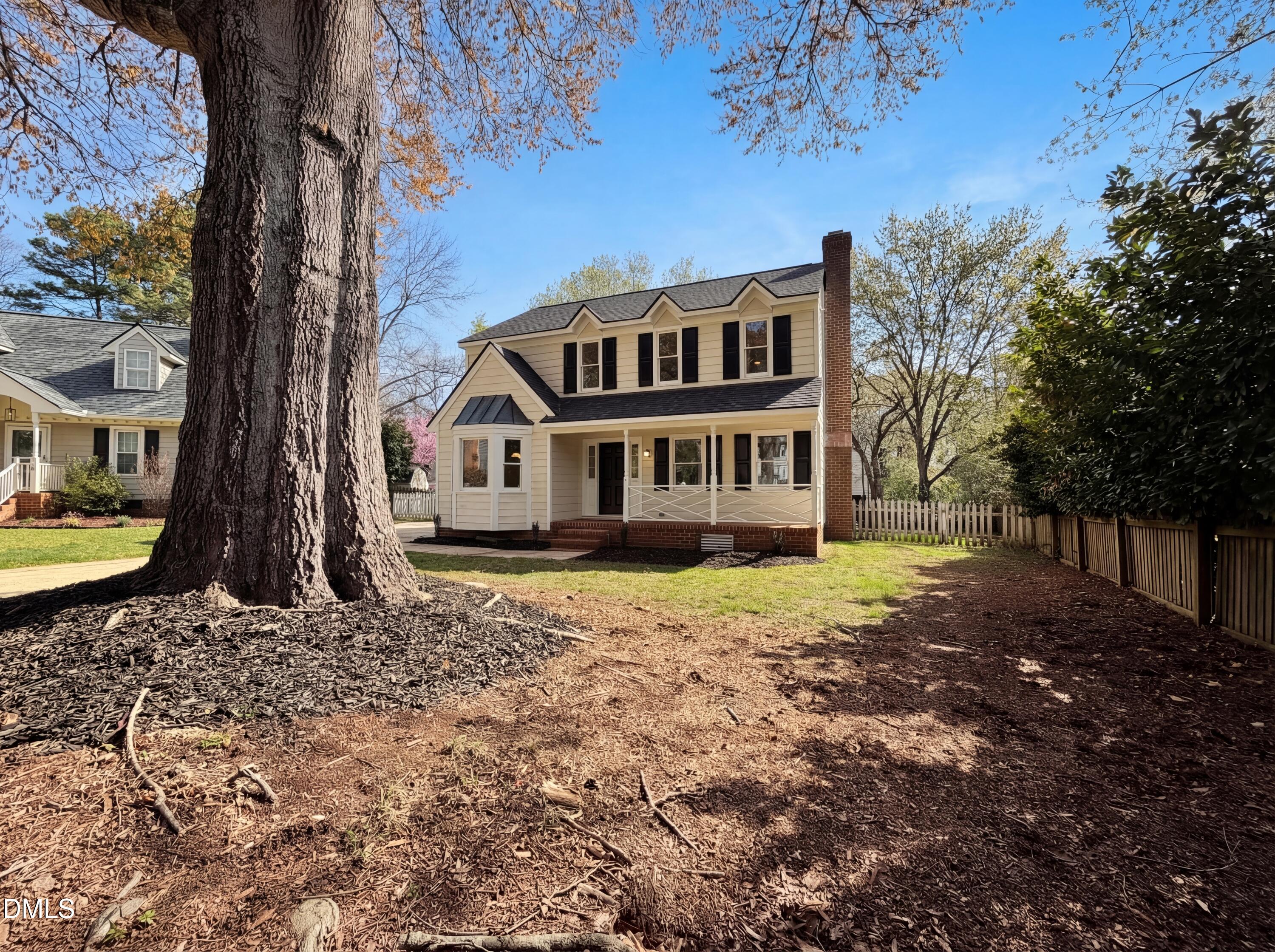 8612 Clovehitch Court Raleigh, NC 27615 - Photo 3 of 25 a front view of a house with a yard