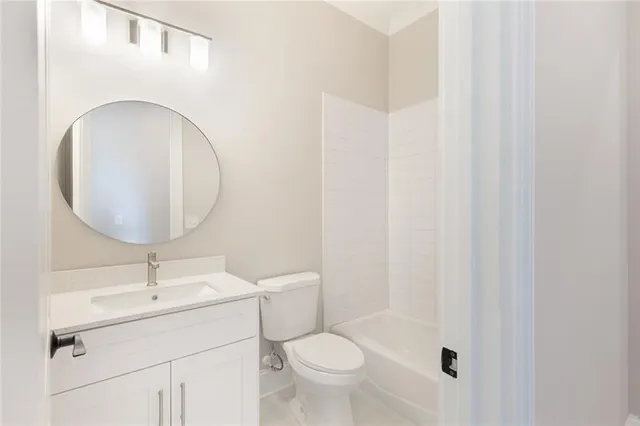 a view of a hallway with entryway door