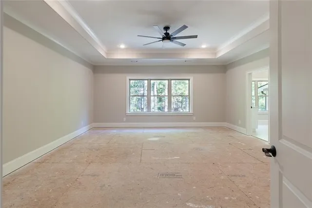 a spacious bathroom with a bathtub and sink