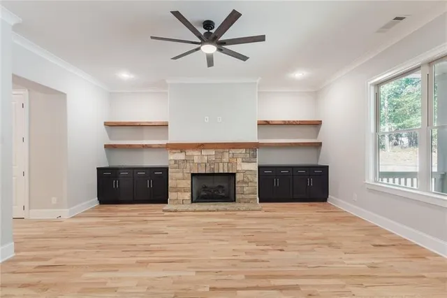 a kitchen with a sink stove and refrigerator