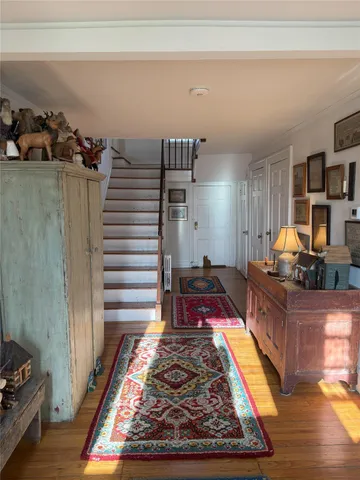 a bathroom with a toilet a sink and shower