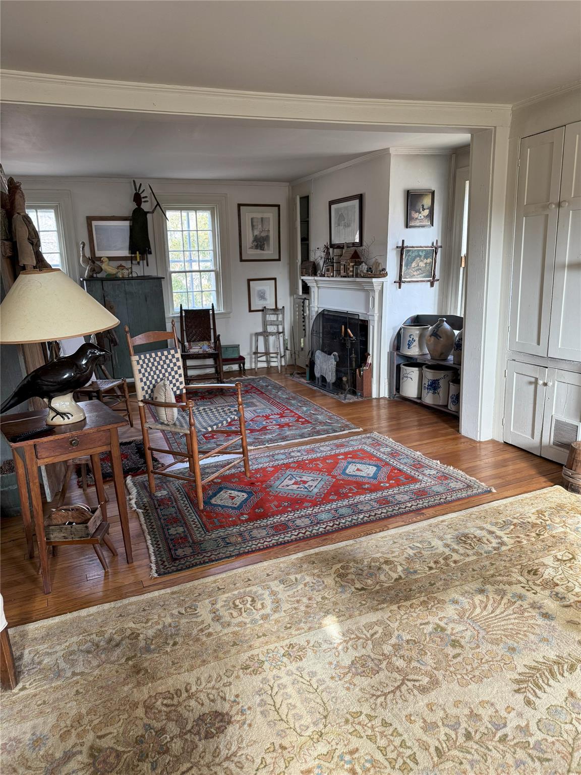 124 East Ridge Road Warwick, NY 10990 - Photo 20 of 46 a living room with furniture a fireplace and a flat screen tv