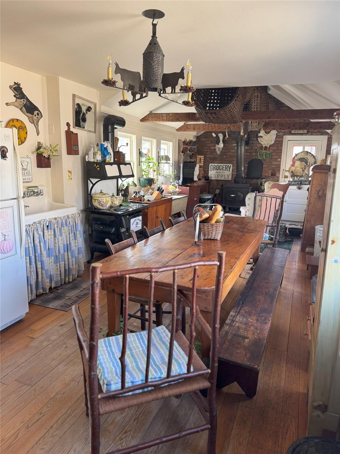 124 East Ridge Road Warwick, NY 10990 - Photo 24 of 46 a view of a dining room with furniture and chandelier