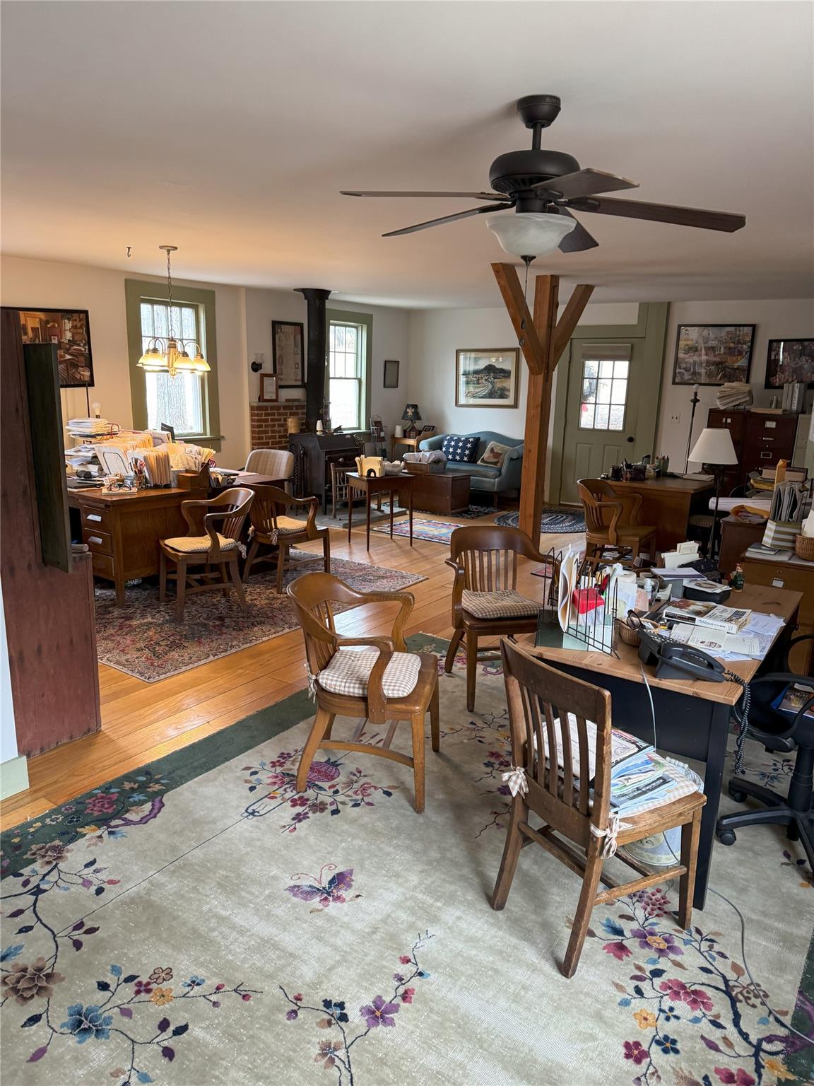 124 East Ridge Road Warwick, NY 10990 - Photo 39 of 46 a living room with lots of furniture and a chandelier
