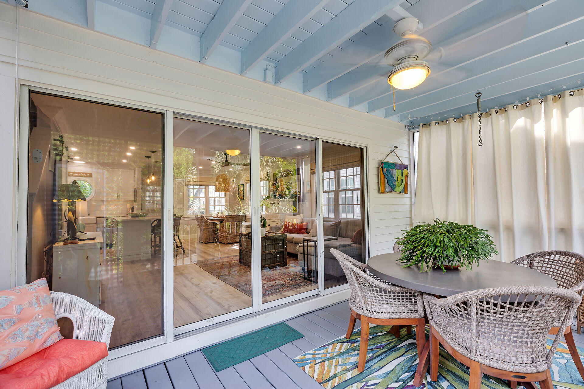 21 Whistling Duck Lane Key West, FL 33040 - Photo 19 of 45 a living room with furniture and a potted plant