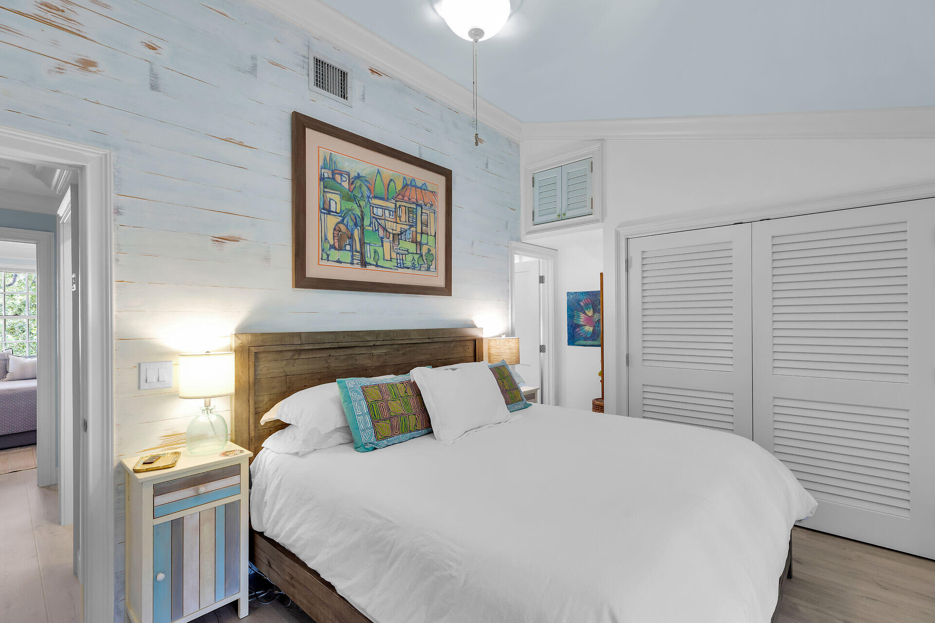 21 Whistling Duck Lane Key West, FL 33040 - Photo 23 of 45 a bedroom with a bed and a window