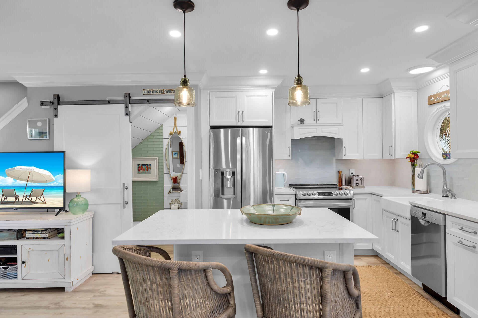 21 Whistling Duck Lane Key West, FL 33040 - Photo 5 of 45 a kitchen that has a lot of cabinets in it and appliances