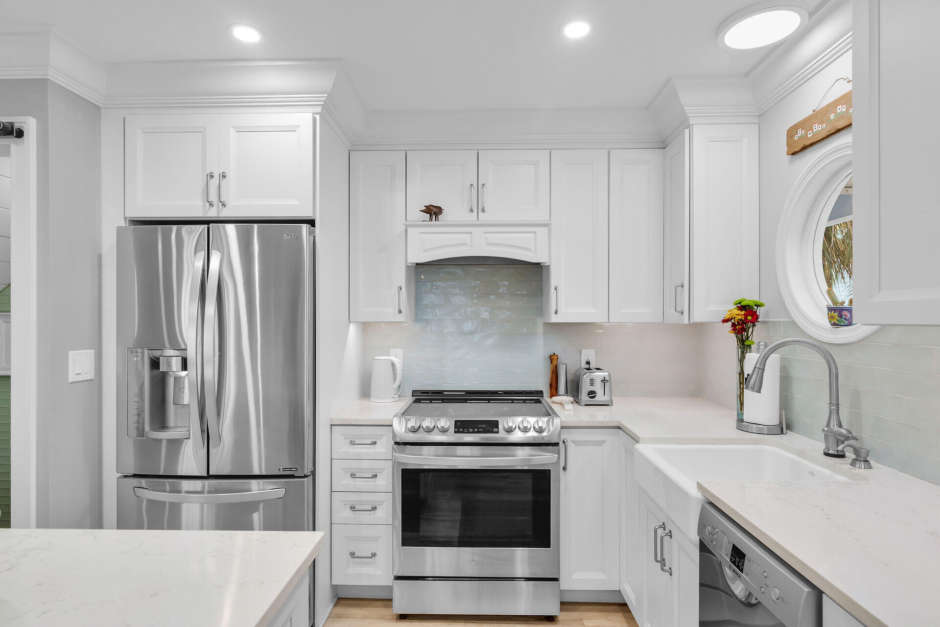 21 Whistling Duck Lane Key West, FL 33040 - Photo 8 of 45 a kitchen with stainless steel appliances a stove a sink and a refrigerator