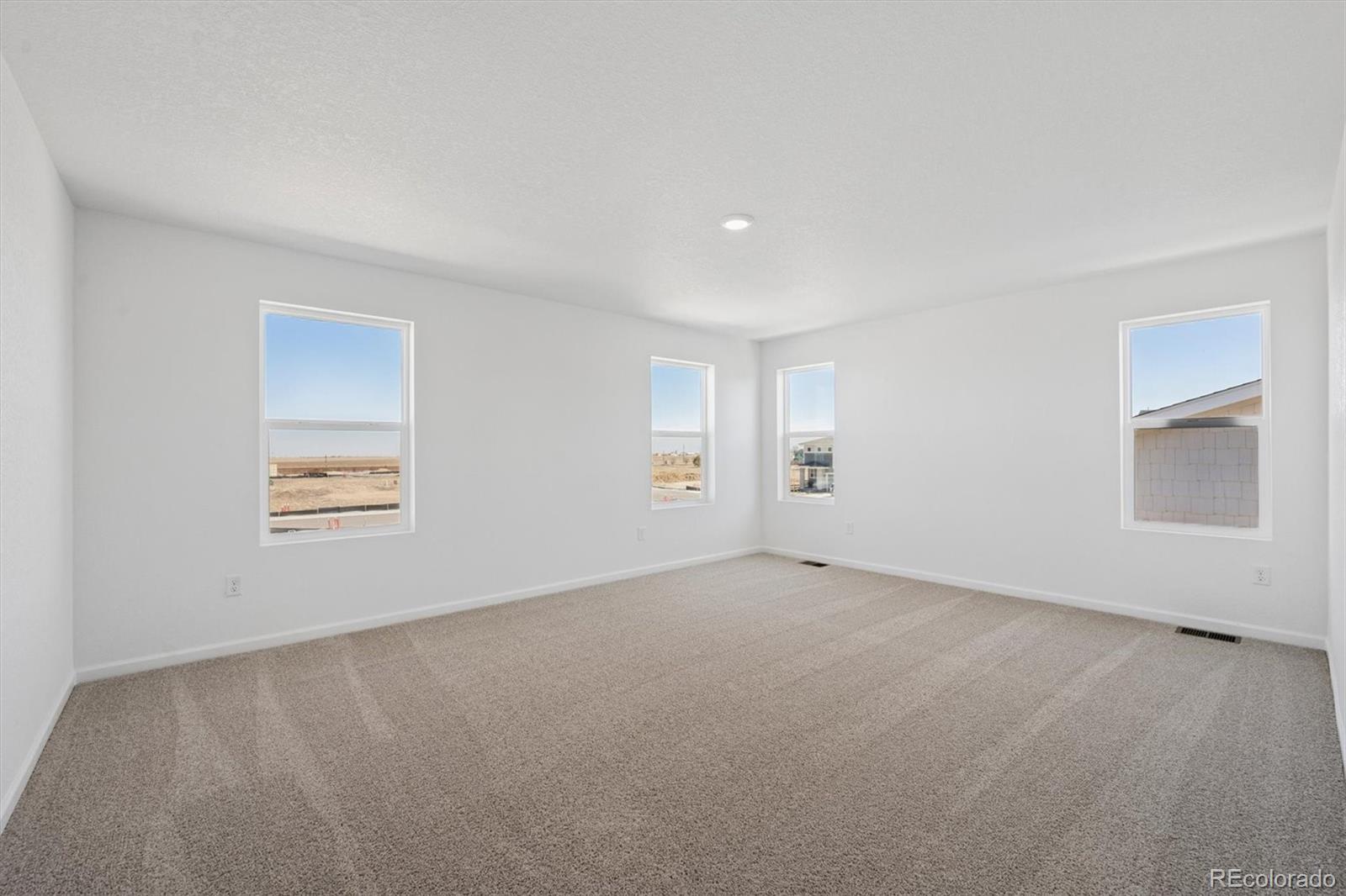 45935 Gentry Avenue Bennett, CO 80102 - Photo 12 of 22 a view of an empty room with a window