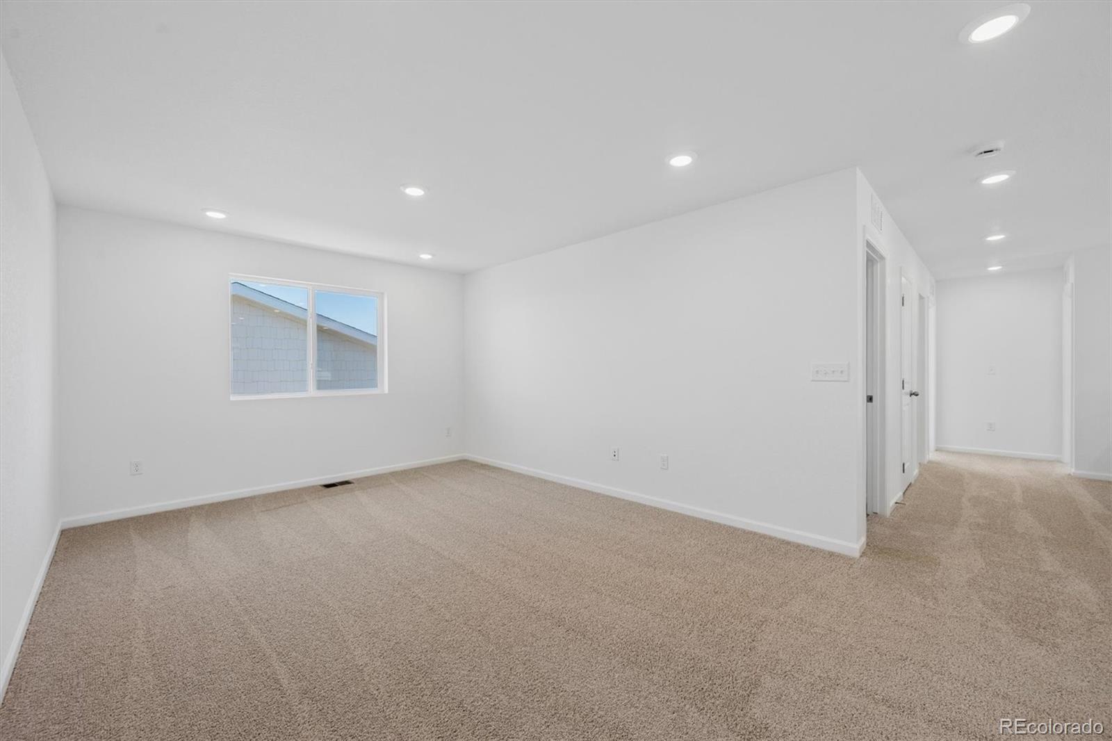 45935 Gentry Avenue Bennett, CO 80102 - Photo 14 of 22 a view of an empty room