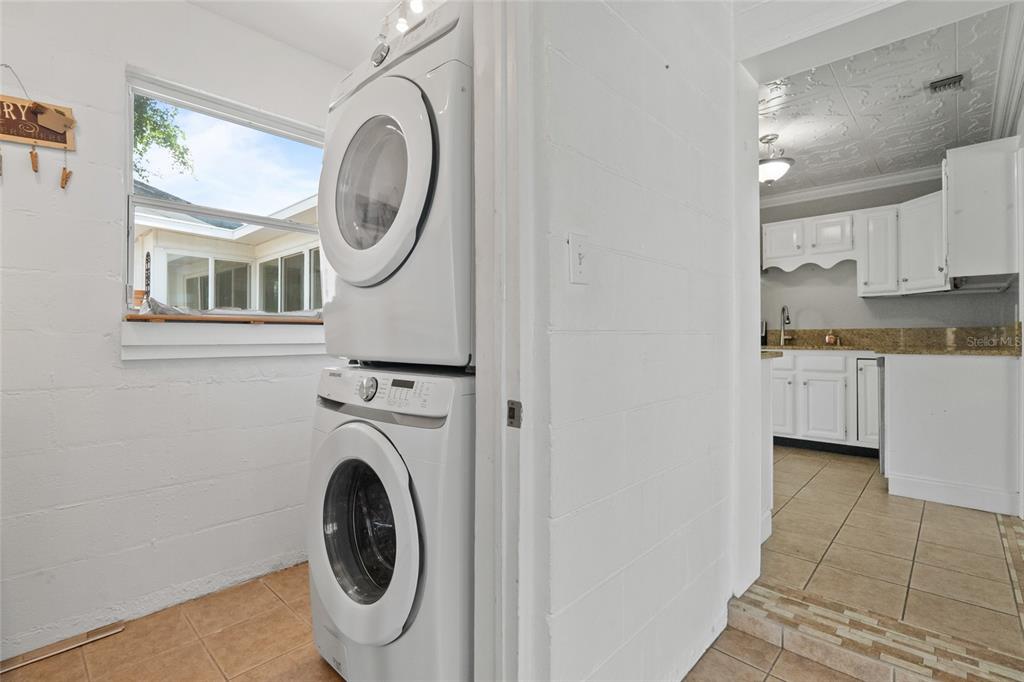 1603 Tulane Street Orlando, FL 32804 - Photo 15 of 27 a utility room with sink dryer and washer